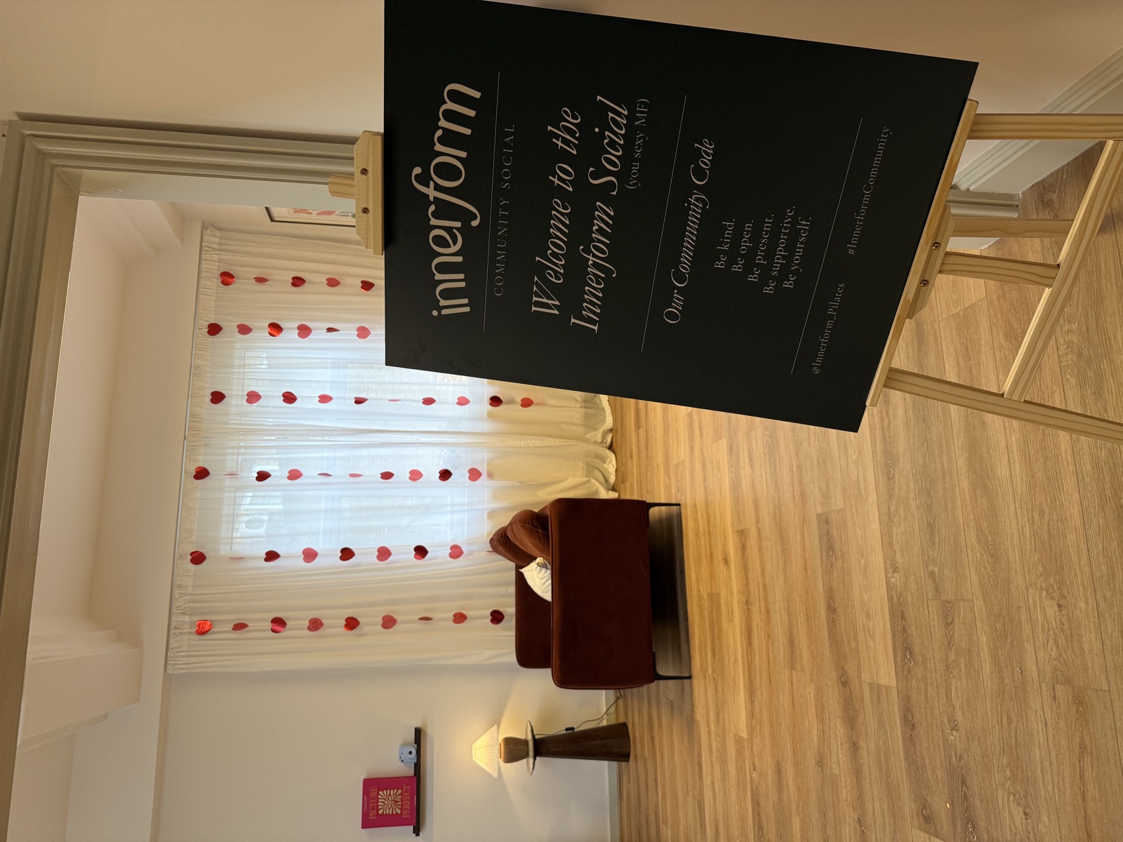 Innerform's communal area at the Lewis Grove studio, with members between classes.
